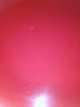 Abstract red background with different elements in space in close up effect 스톡 사진
