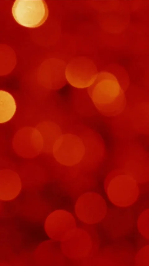 Abstract red background with glowing circular bokeh lights for festive holiday Video stock 347692354
