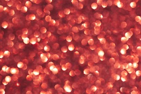 Abstract red background. Shiny glitter bokeh in red colors. Selective focus. Stock Photos