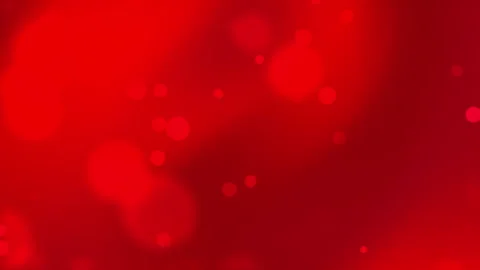 Abstract red background with soft bokeh lights creating a vibrant and warm Stock Footage 313041345