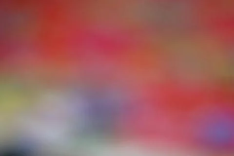 Abstract red background with soft bokeh. Blurred colorful texture for creat.. Stock Photos