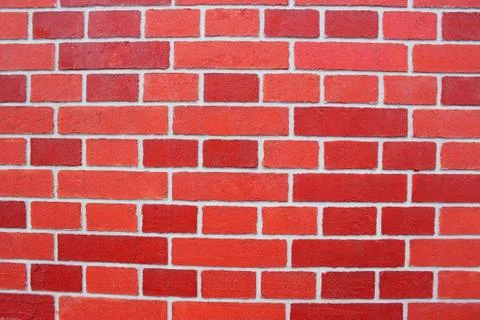 Abstract red brick wall texture depicting in paint colors on an old brick wall Stock Photos