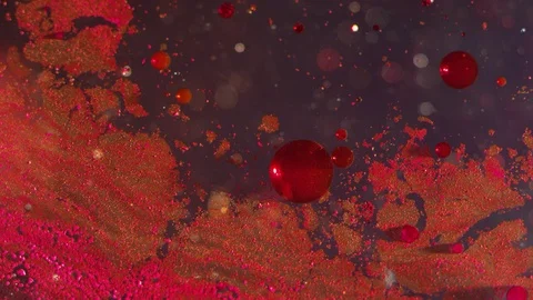 Abstract red bubbles and particles liquid bokeh texture background 動画素材 118295568