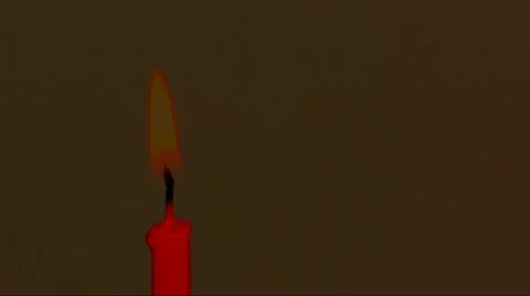 Abstract red burning candle  on brown background Stock Footage 49886840