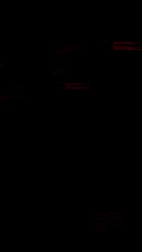 Abstract red digital text malfunction and glitch distortion effect on black Stock Footage 338197632