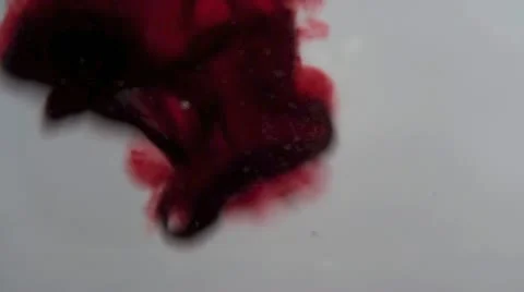 Abstract Red Drops Of Color Liquid Into Water Video stock 22191815