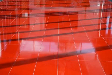 Abstract red floor structure with shadows and reflections Stock Photos