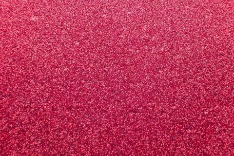 Abstract red glitter background with rough textured Stock Photos