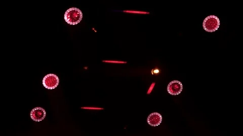 Abstract red glowing lights on black background Stock Footage 337800390