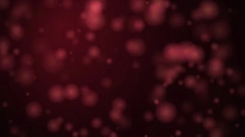 Abstract red glowing particles floating slowly in a dark space with soft bokeh Stock Footage 345427790