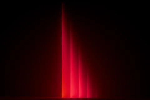 Abstract red gradient rays in a row of neon light on a black background. 3D r Stock Illustration