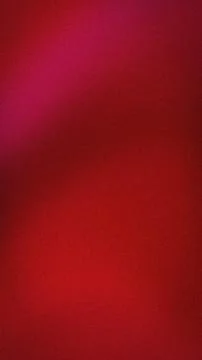 Abstract red grainy vertical background with shades of magenta and dark red.. Stock Photos