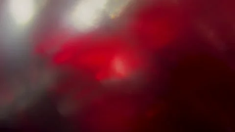 Abstract red light leak texture with lens flare Video stock 344986270
