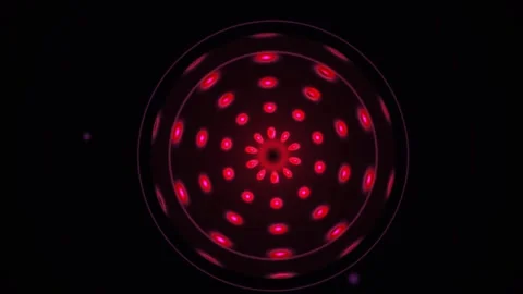 Abstract red light particles rotating in a circular kaleidoscopic pattern o.. Stock Footage 334511726
