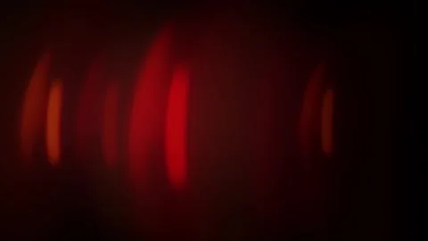 Abstract Red Light Patterns on Dark Background Capturing Mystery and Elegance Stock Footage 341917600