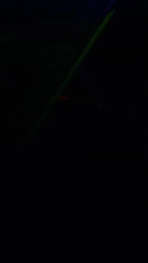 Abstract red light refraction motion background with dark atmosphere and Stock Footage 347692414