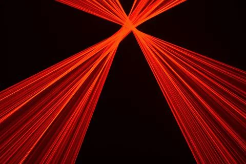Abstract red lines drawn by light on a black background Stock Illustration