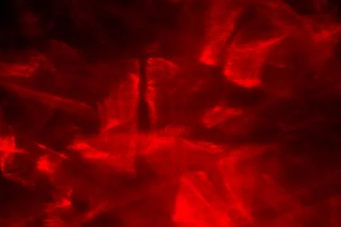 Abstract red lines drawn by light on a black background Stock Illustration