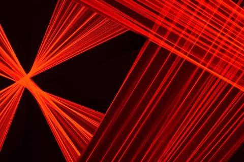 Abstract red lines drawn by light on a black background Stock Illustration
