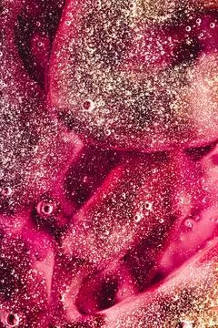 Abstract red liquid background, paint splash, swirl pattern and water drop... Stock Photos