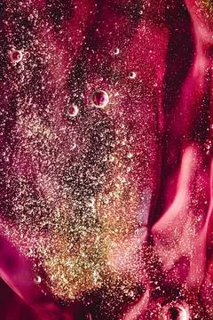 Abstract red liquid background, paint splash, swirl pattern and water drop... Stock Photos