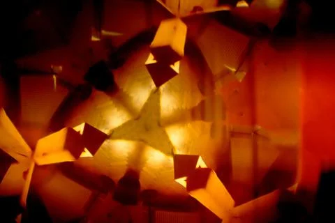 Abstract red orange background with triangular parts and warm colors Stockfoto's