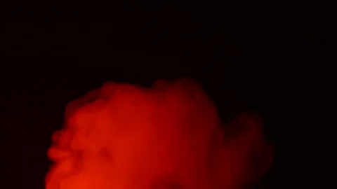 Abstract red smoke in slow motion. Smoke, a cloud of cold fog on a dark back Stock Footage 169275809