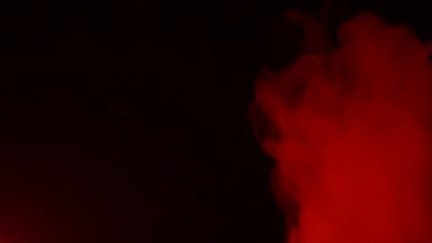 Abstract red smoke in slow motion. Smoke, a cloud of cold fog on a dark back Stock Footage 169275813