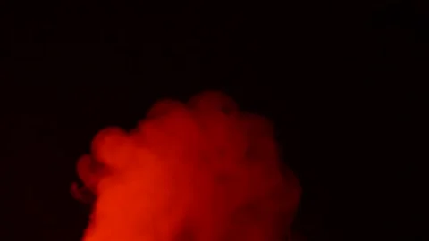 Abstract red smoke in slow motion. Smoke, a cloud of cold fog on a dark back Stock Footage 169275850