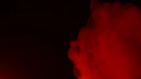 Abstract red smoke in slow motion. Smoke, a cloud of cold fog on a dark back Stock Footage 169275866