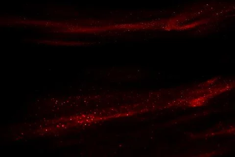 Abstract red speed camera motion background over glowing lights with sparkles Stock Photos