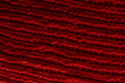 Abstract red textile texture macro, soft fabric surface with detailed fibers Stockfoto's