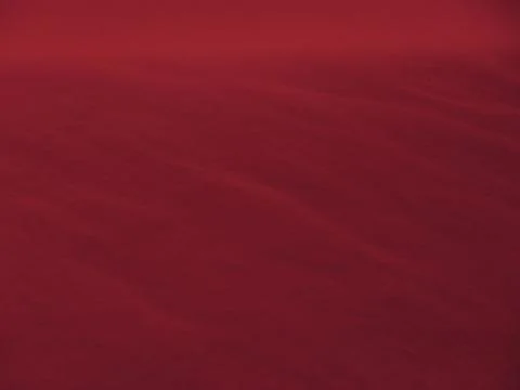 Abstract red texture background with soft light and shadow on a smooth surfac Stock Photos
