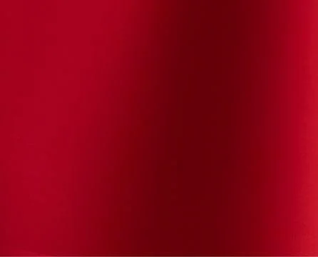 Abstract red textured background with smooth gradient. Clean close up surface Foto stock