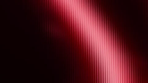 Abstract red vertical light streaks flowing across a dark background motion.. 库存影片 337723687