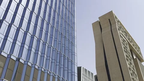 Abstract Reflection of Blue Sky on Glass Corporate Building in Riyadh Stock Footage 333866377