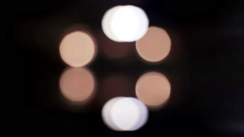 Abstract reflections on the surface of the water. Reflections of lanterns in the Stock Footage 134516124