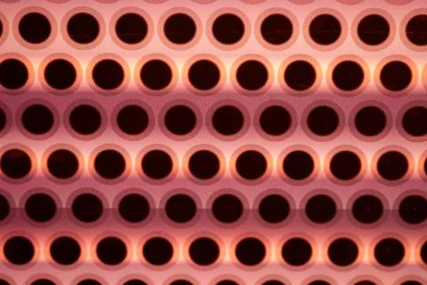 Abstract Repeating Circle Pattern with Warm Lighting Foto stock