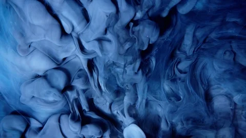 An Abstract Representation Featuring Swirling Smoke in Beautiful Blue Tones and Stock Footage 303604170