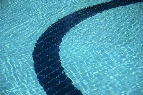 Abstract ripple pattern on blue clean water of swimming pool Copyright: xS... Stock Photos