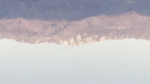 Abstract Ripple Patterns Dissolve Mountain Peaks in Desert Water Stock Footage 331275310