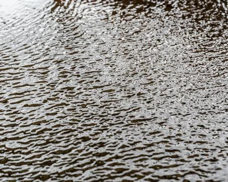 Abstract Ripple Patterns on Wet Sand Stock Photos