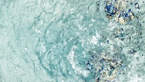 Abstract ripples and bubbles in motion Stock Footage 240869813