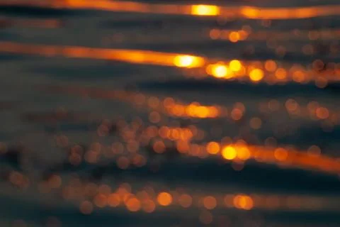 Abstract romantic background, waves at sunset in defocus Foto stock