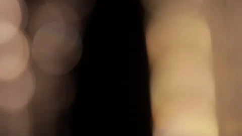 Abstract rotating glass light reflections on a black background Stock Footage 250621376