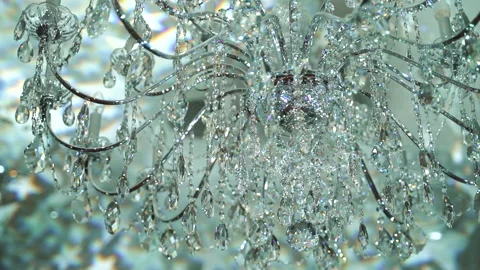 Abstract rotating of many glass elements that shine by reflecting light. Stock Footage 197366420