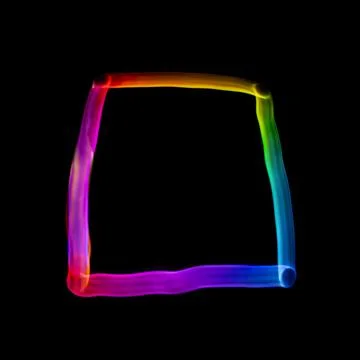 Abstract rotating neon lights texture with black empty copy space inside. col Stock Photos