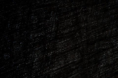 Abstract rough dark background of linen natural fabric on the light, short fo Foto stock