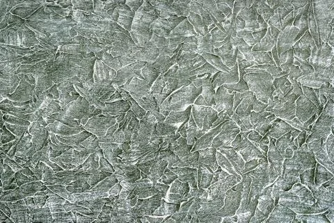 Abstract rough dark textured surface slightly painted with white paint. Stock Photos