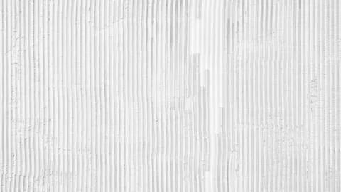 Abstract rough texture with vertical stripes on concrete wall black and white Foto stock